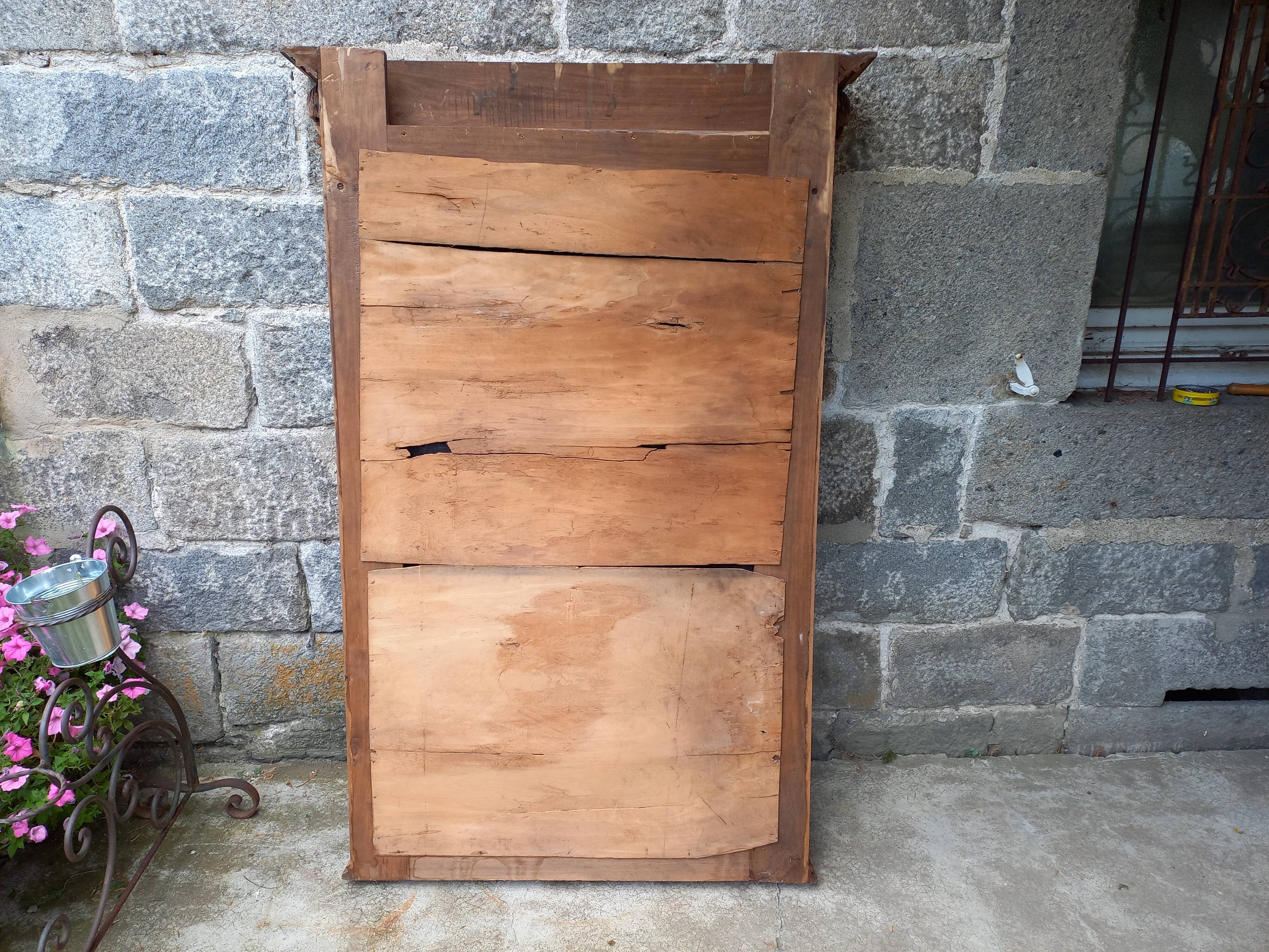 Carved wooden mirror, 168x112 cm