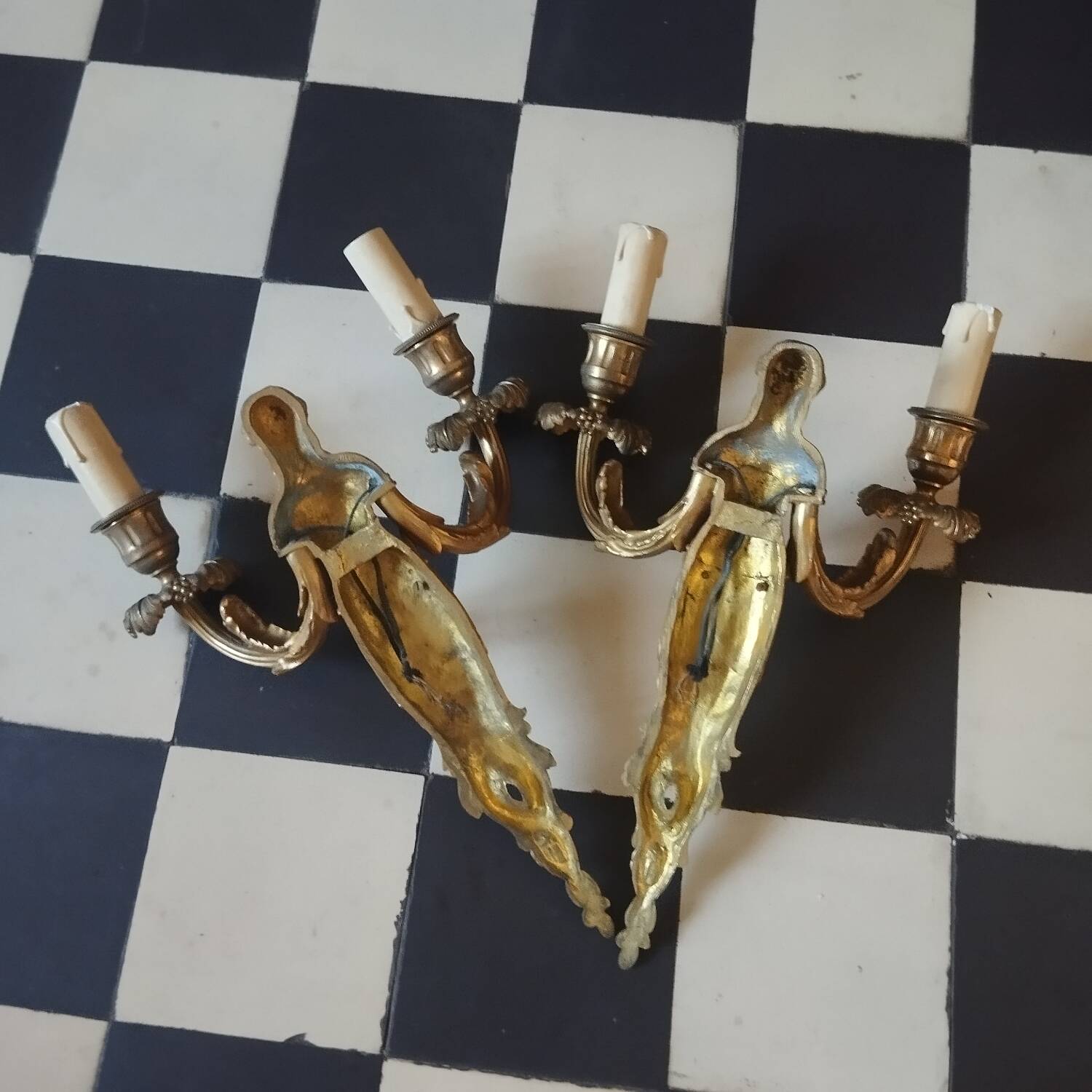 Paire d'appliques cariatides bronze doré