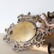 Pair of old French wall lights with beveled mirror and putti