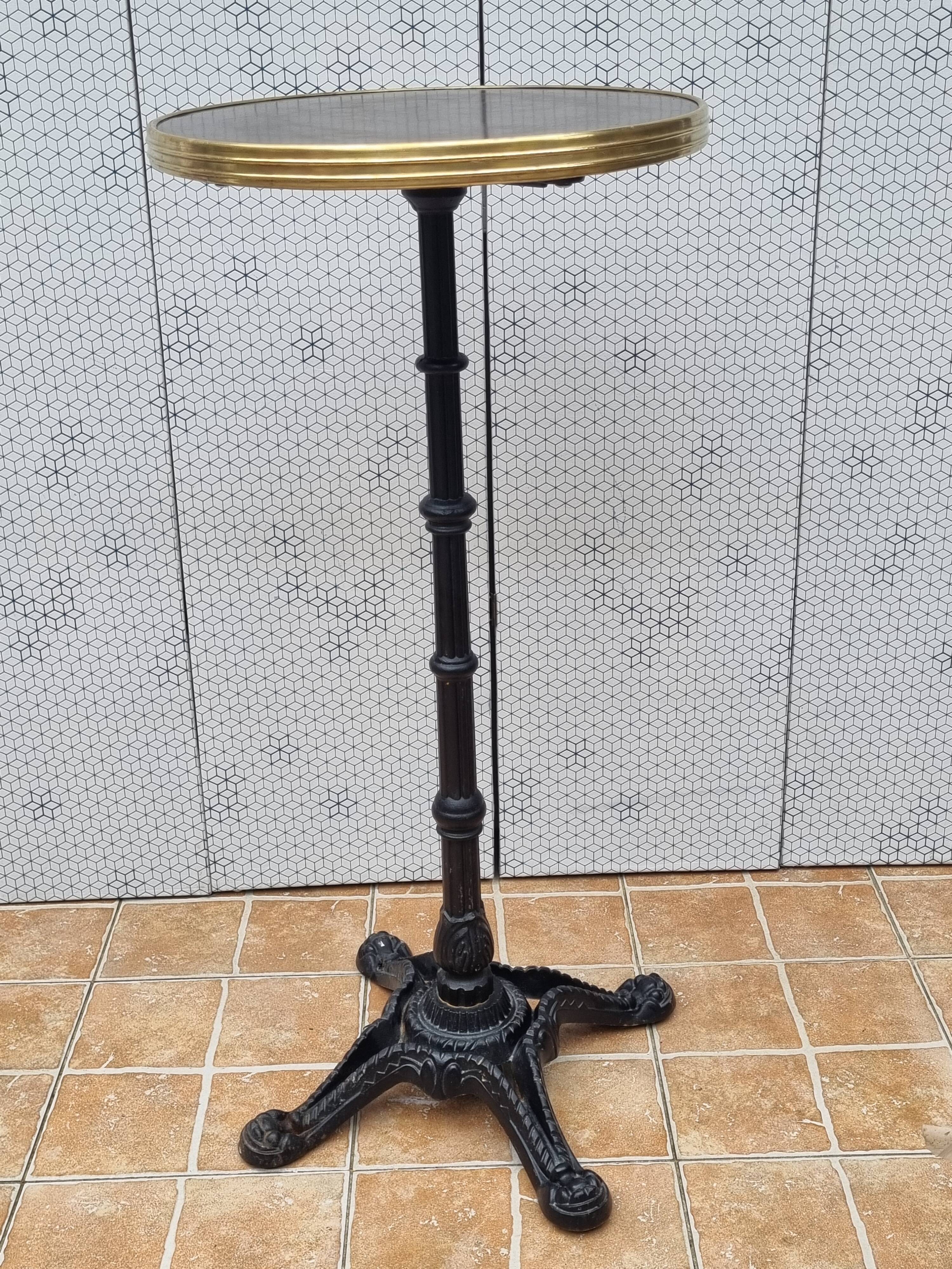 Vintage cast iron and brass "standing" bistro table, 109 cm