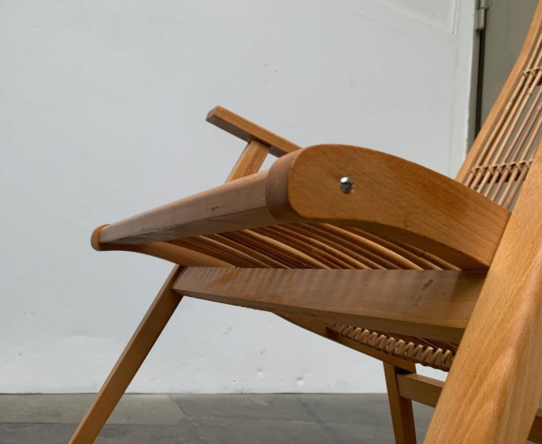 Mid-century German rattan rocking chair from Deutschen Werkstätten Hellerau, 1960s.