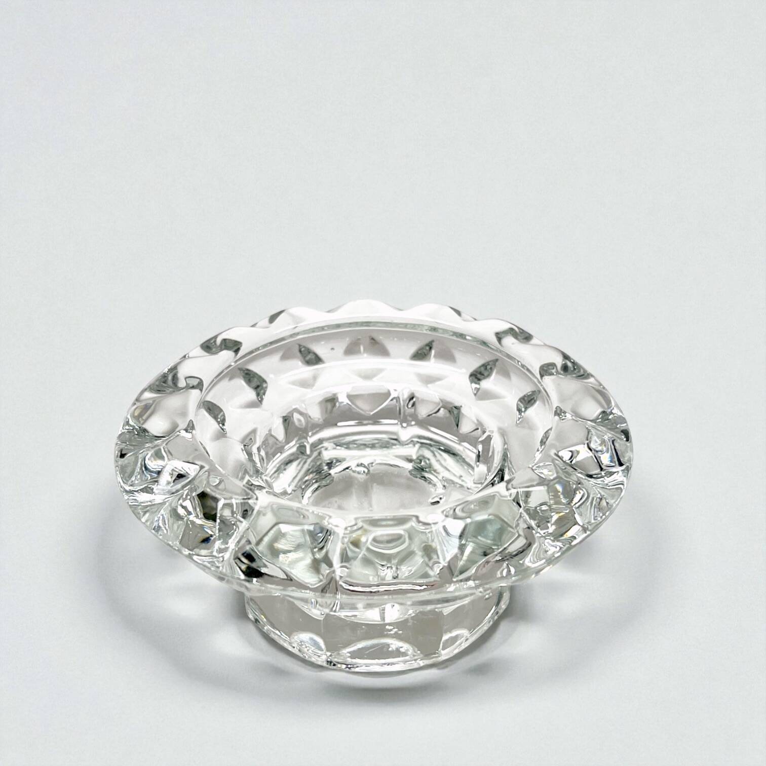 Vintage Art Deco candlestick in transparent moulded crystal glass