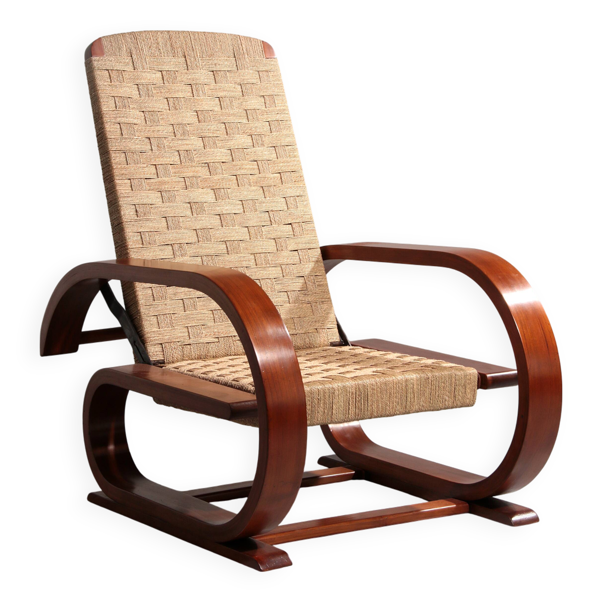 An exceptionally rare mahogany recliner crafted in Italy during the 1950s"