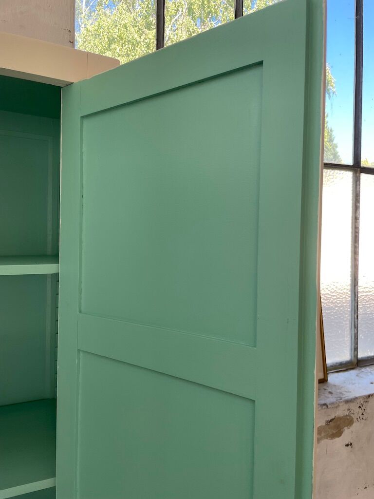 White and green cutter cabinet