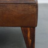 Hocker/coffee table made of sheepskin