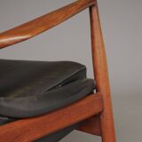 Fauteuil Seal en cuir et teck Ib Kofod-Larsen pour OPE, Suède, années 1960.