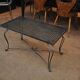 Table basse metal perforé pied fer forgé 1940