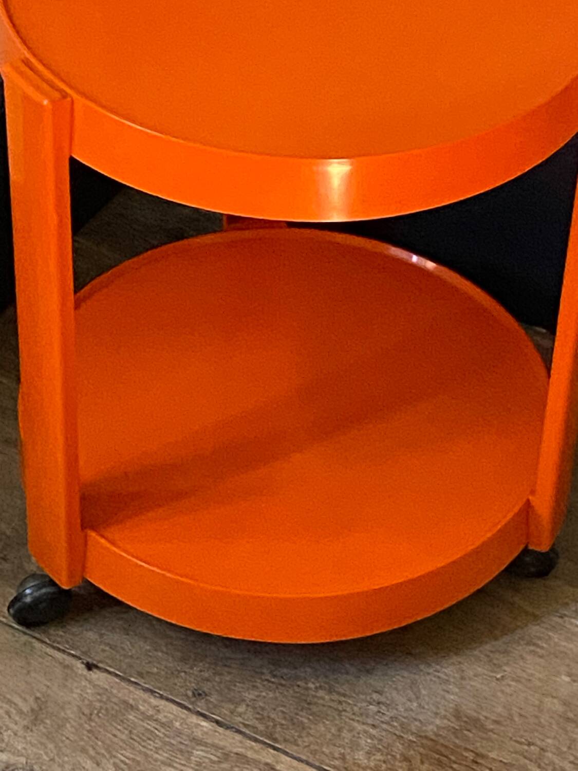 Vintage / designer / orange plastic rolling trolley,