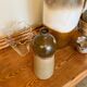 Enamelled ceramic bottle
