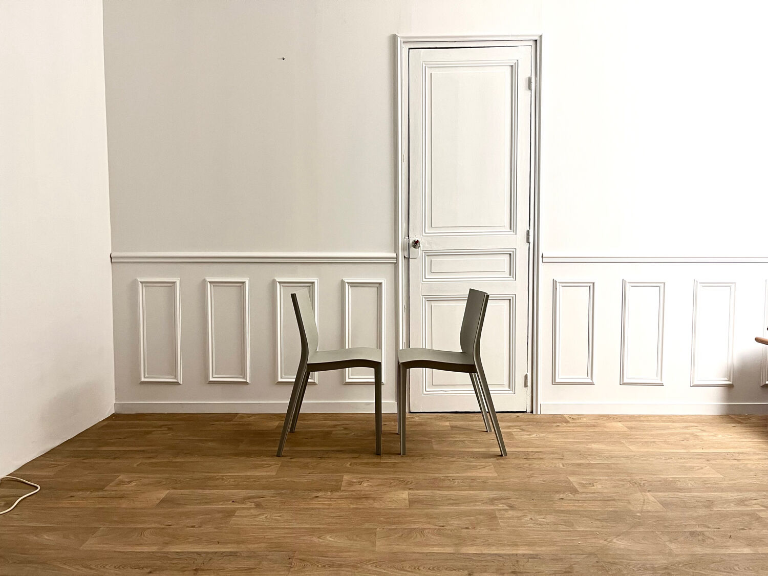 Chaises slick slick par Philippe Starck