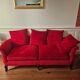Three-seater sofa Verneuil and red armchair sofa Solenne