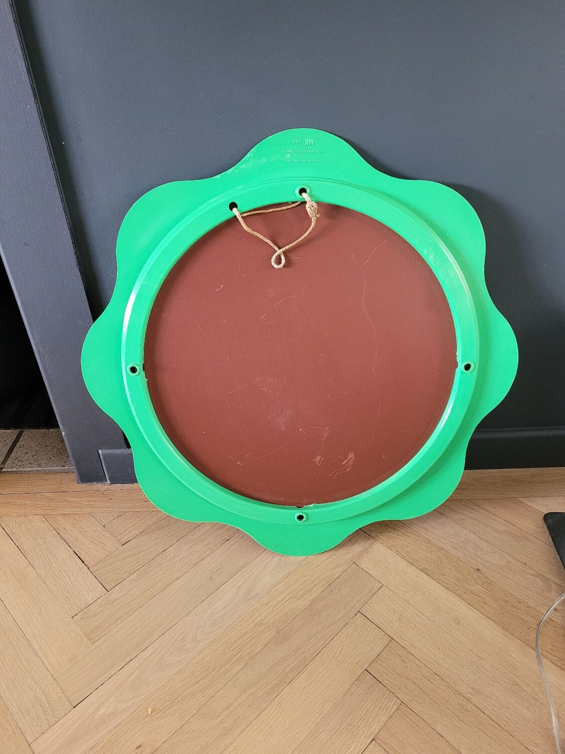 Plastic flower mirror by Finnish designer Makisen Kuvastin