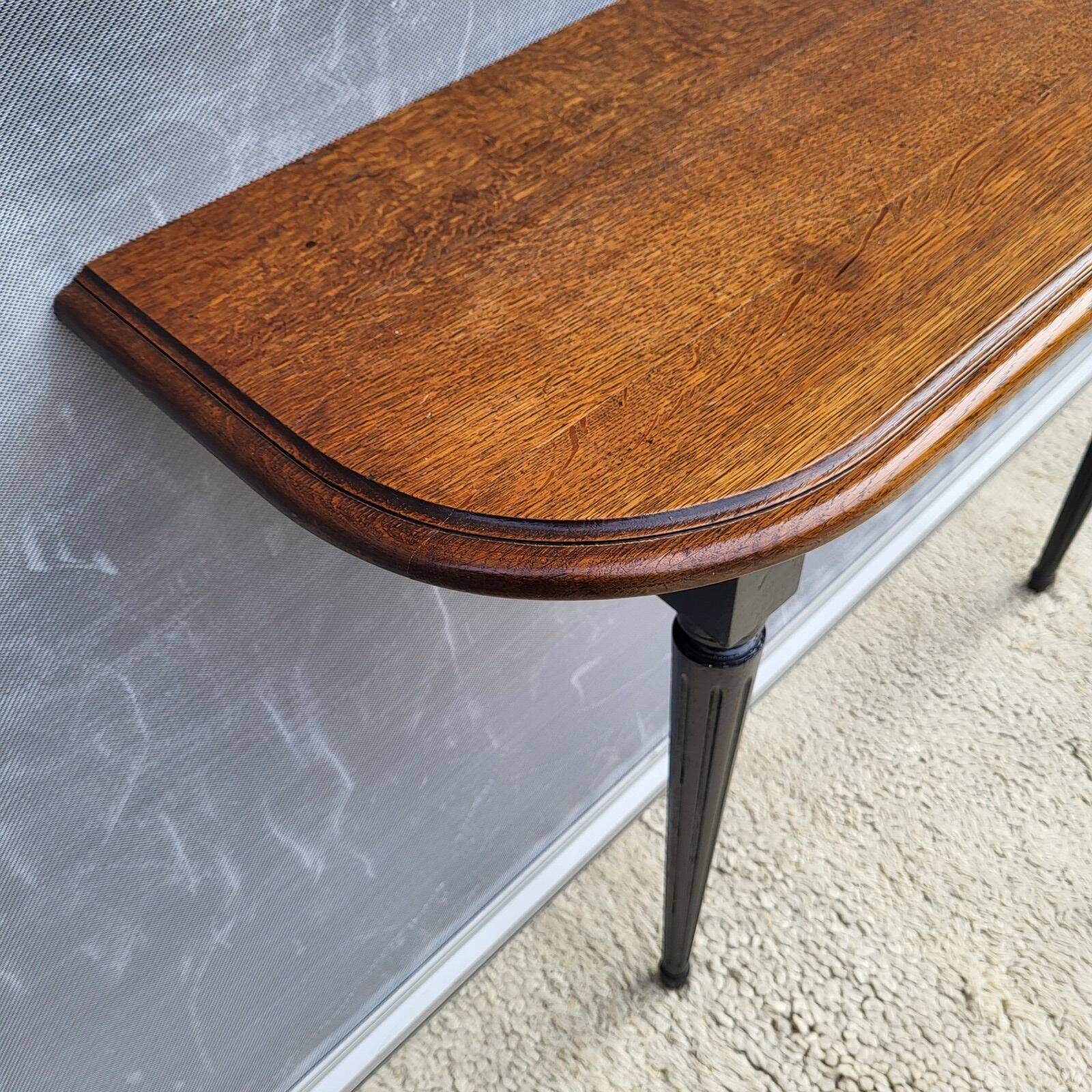 Console bicolore noire et chêne style Louis XVI restaurée