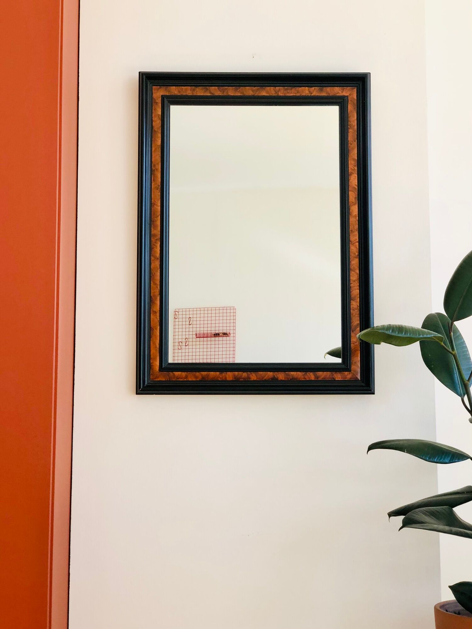 Old wall mirror 72 x 52 cm in black wood and faux mahogany