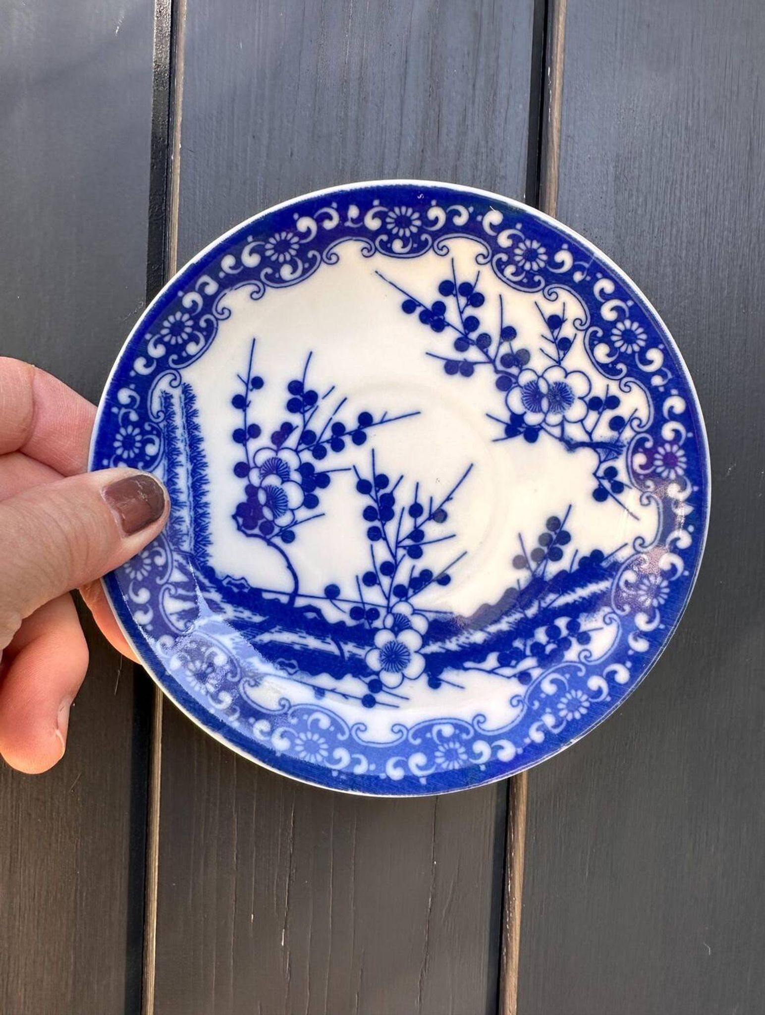 Small vintage plates made in Japan in blue and white porcelain.
