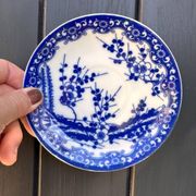 Small vintage plates made in Japan in blue and white porcelain.