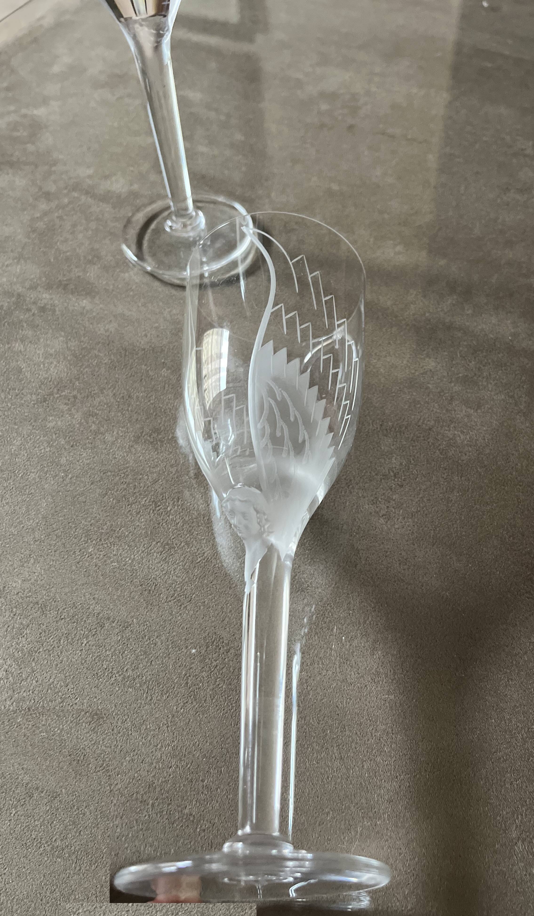 Set of two champagne glasses, crystal, Lalique France, angel model.