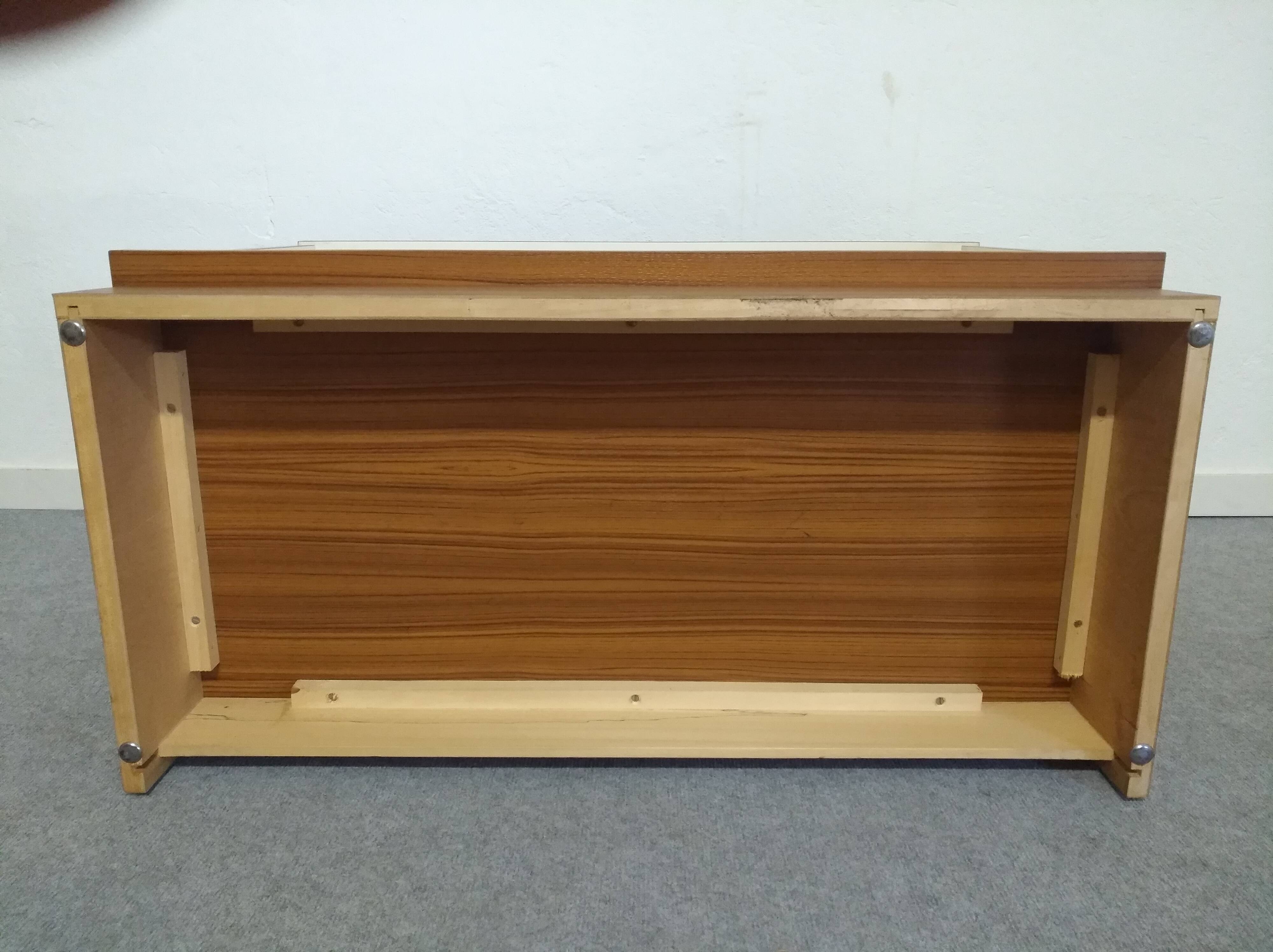 Low chest of drawers with 3 drawers in mahogany and white satin, France circa 1980.