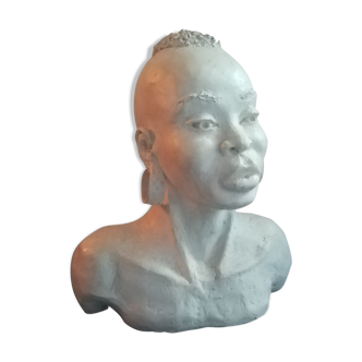 Bust of young African woman plaster patinated.