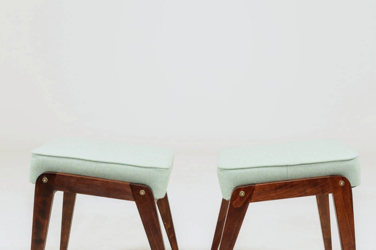 Vintage children's chair stool in pistachio green, mid-century modern design.