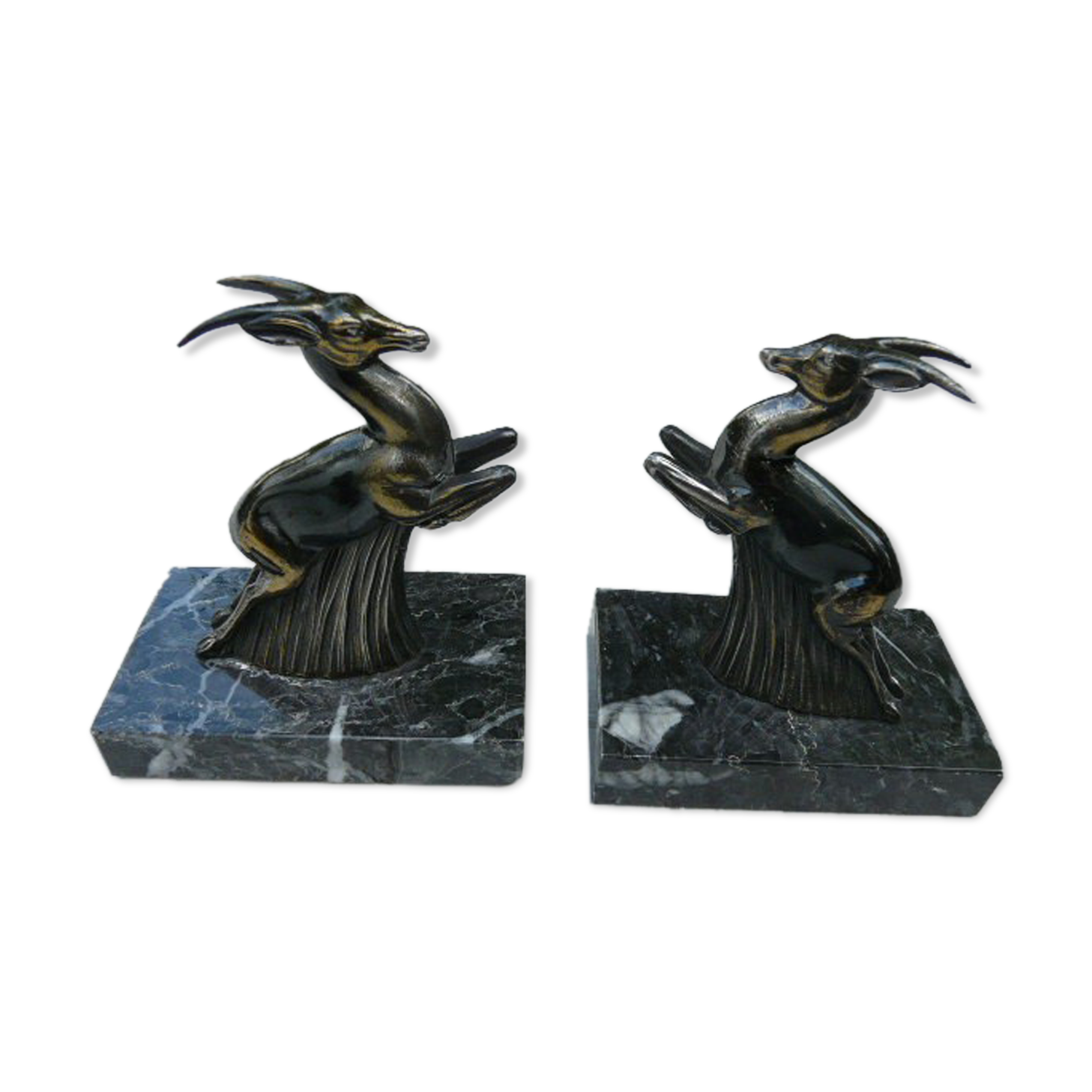 Pair of greenhouse book antelope in regulation on marble base