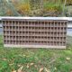 Large piece of professional furniture to hang or place with multiple storage compartments