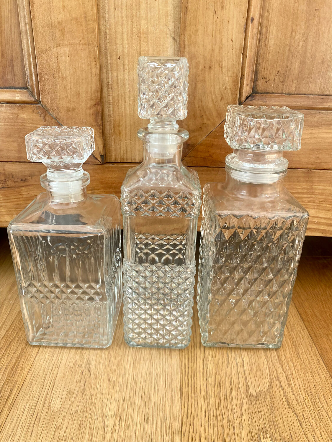 Set of 3 vintage whisky carafe bottles in molded glass