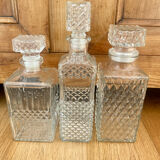 Set of 3 vintage whisky carafe bottles in molded glass