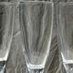 Set of 5 glass champagne flutes with twisted ribbed base