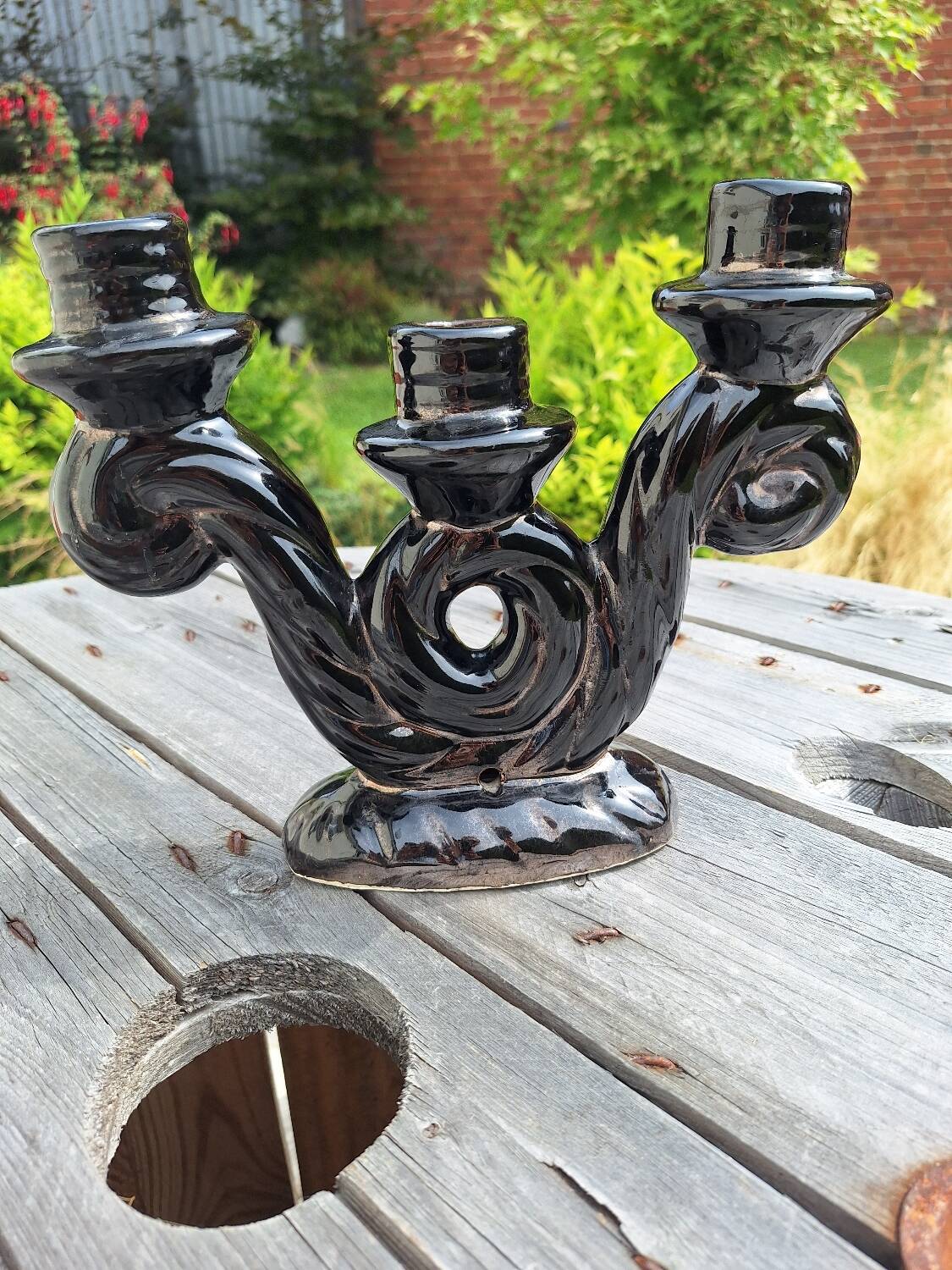 Iridescent black ceramic candle holder
