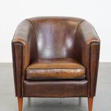 Sheep leather club chair finished with black piping