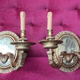 Pair of Louis XVI style solid gilded bronze wall sconces.