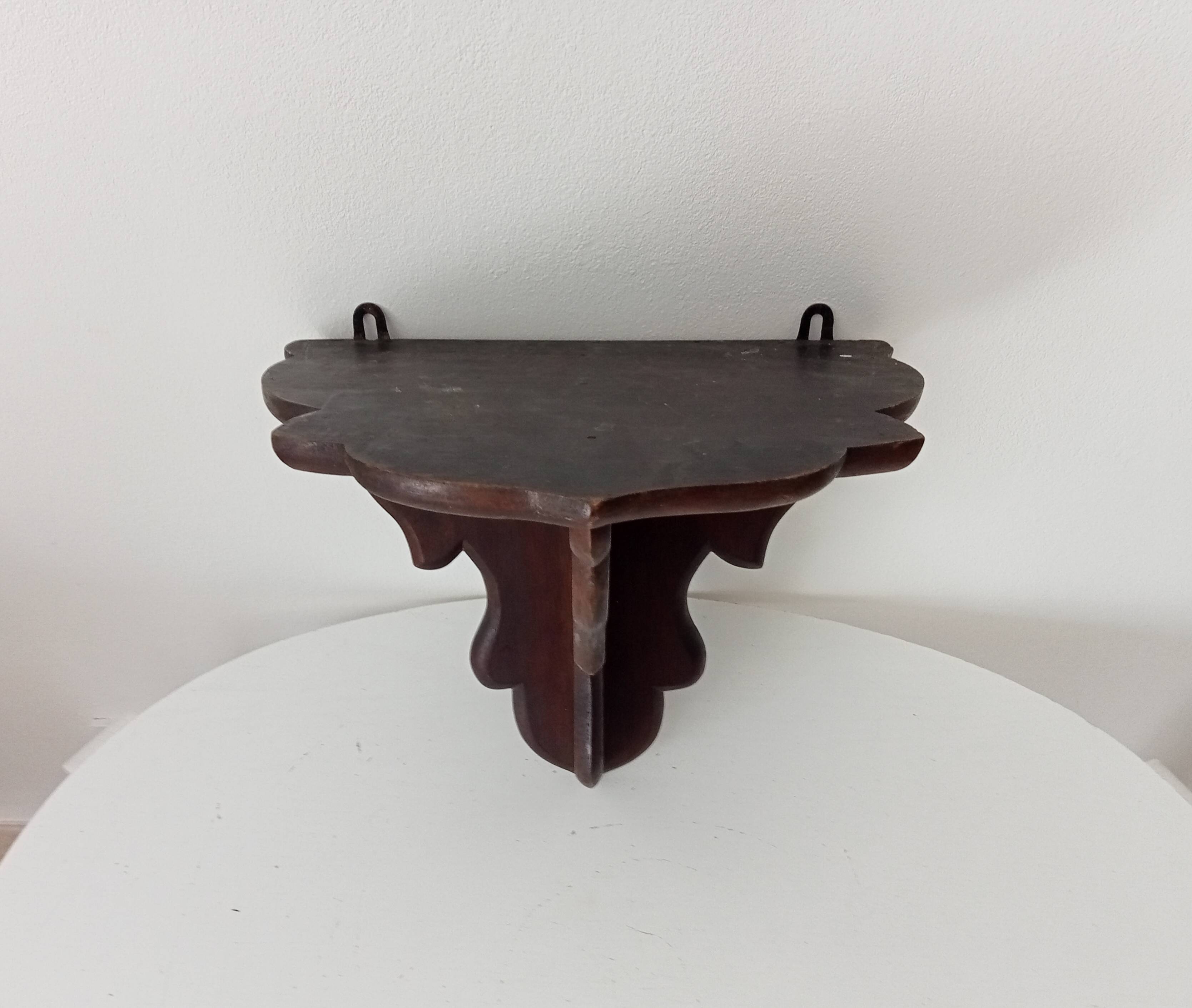 Pair of antique carved wooden shelves