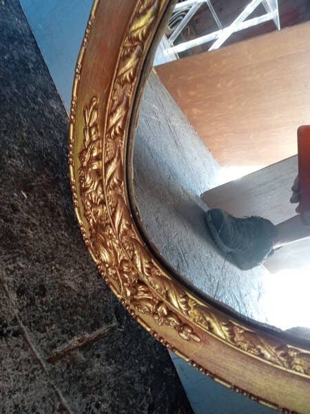 Oval mirror 134cm wood and gilded stucco early 20th century