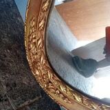 Oval mirror 134cm wood and gilded stucco early 20th century