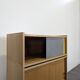 Modernist sideboard with glass doors in grey and yellow oak veneer.