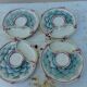 Set of four artichoke plates in earthenware