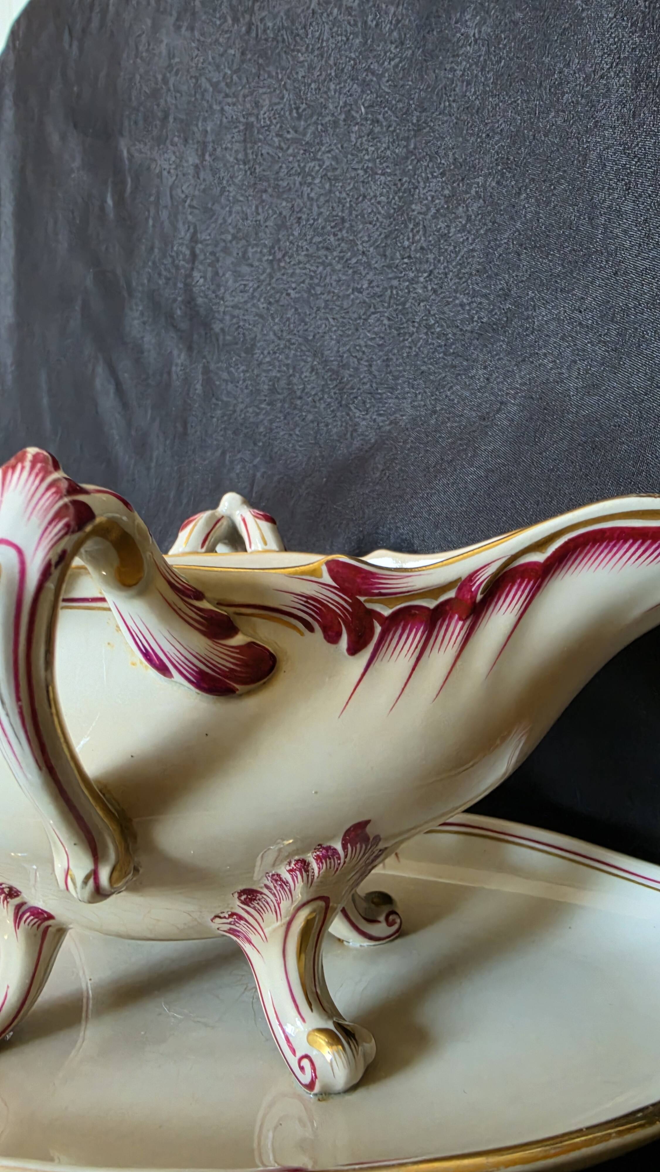 Antique sauce boat in fine earthenware from Sarreguemines, France, neo style.