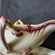 Antique sauce boat in fine earthenware from Sarreguemines, France, neo style.