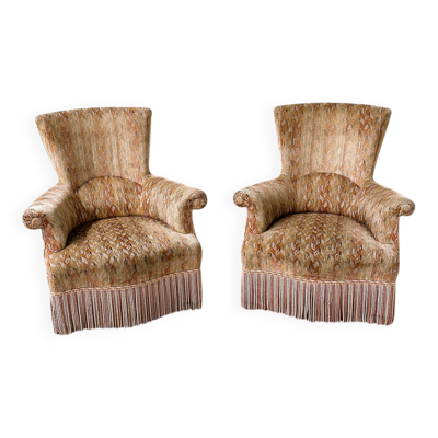 Paire de chaises de salon sculpturales de style Hollywood Regency avec tapisserie à franges d'origine.