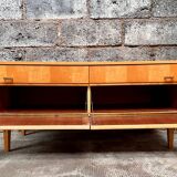 Light wood row TV unit