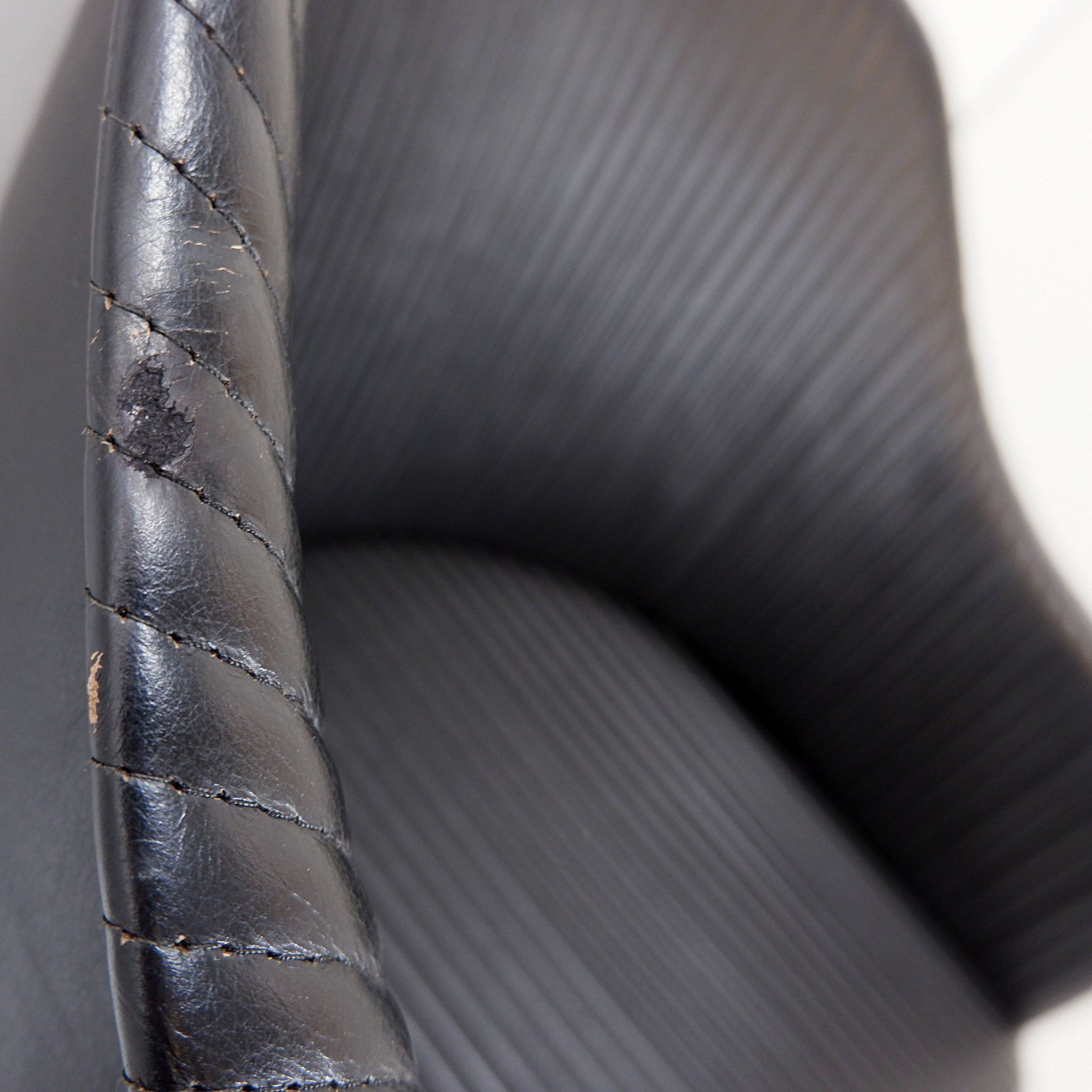 Pair of Artona armchairs in black leather by Afra and Tobia Scarpa for Maxalto.