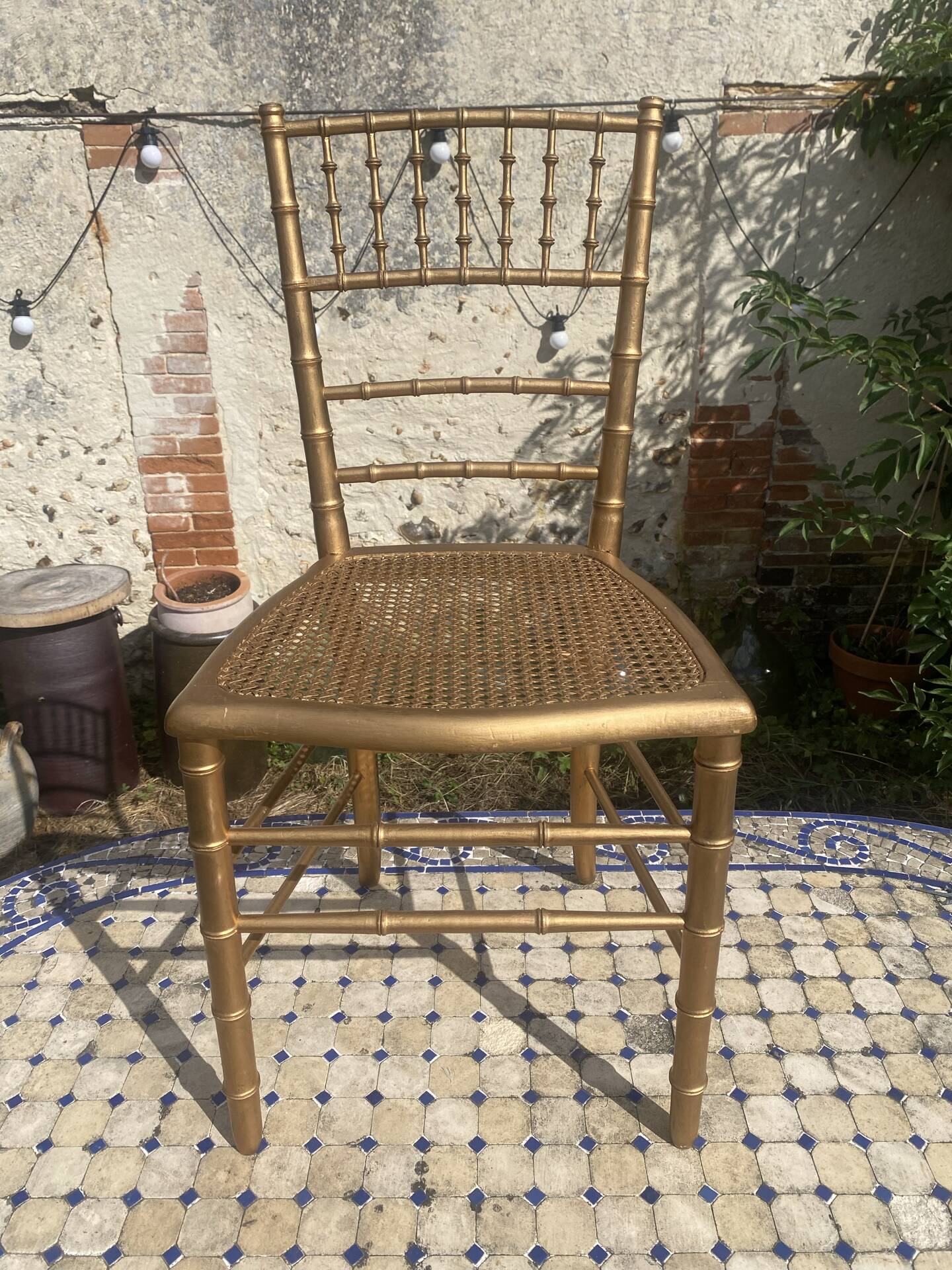 Antique golden bamboo-style chair