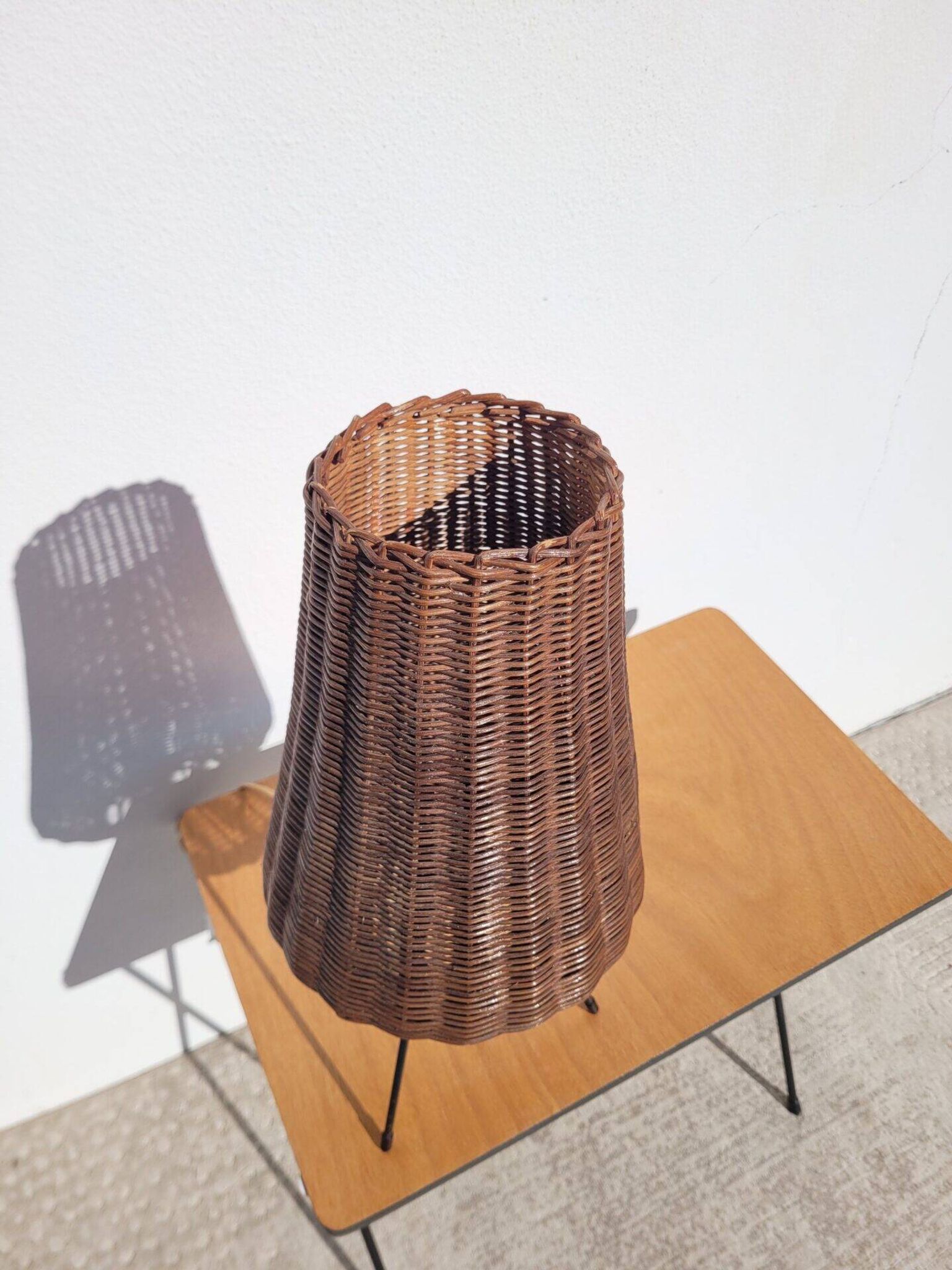 Tripod lamp and rattan from the 1950s.