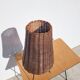 Tripod lamp and rattan from the 1950s.