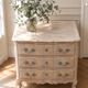 Beautifully crafted Louis XVI style commode in bleached wood.