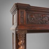 Richly decorated antique fireplace in oak, Belgium ca. 1920