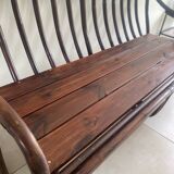 Vintage rattan bench from Maison Kok