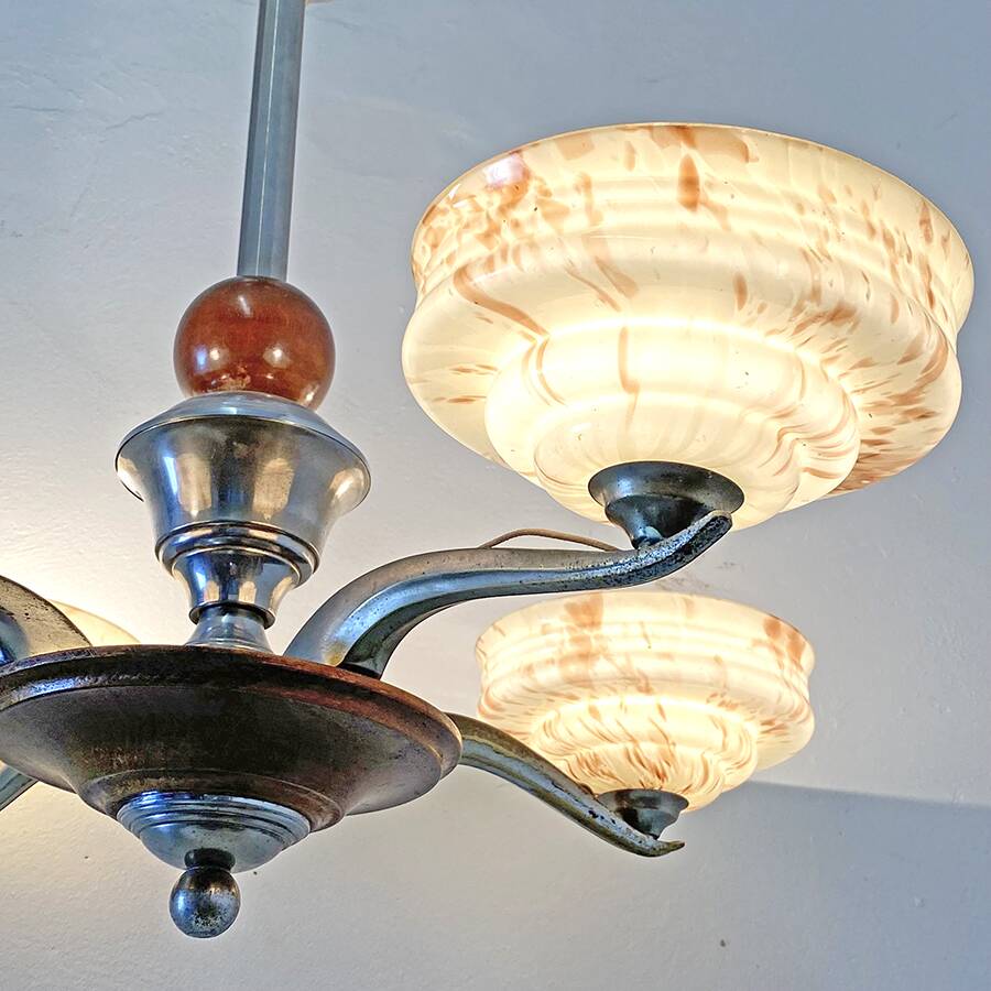 Art Deco chandelier in wood, chrome metal, and glass.