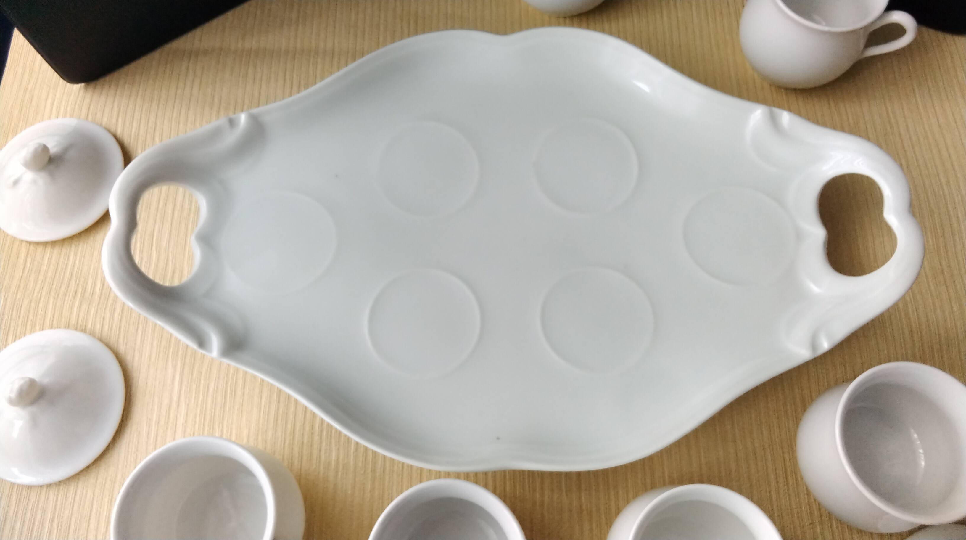 Antique white porcelain cream service